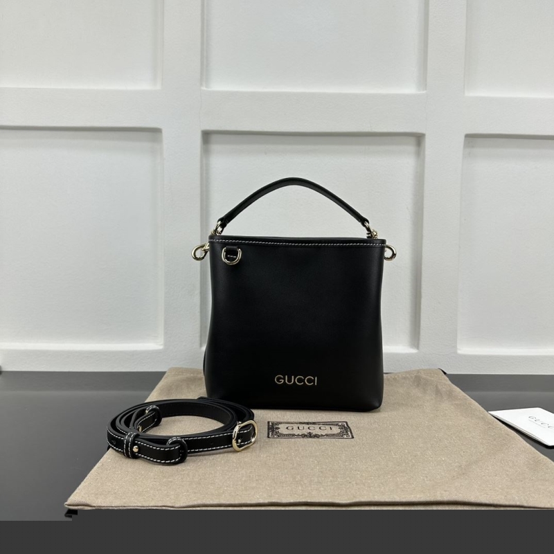 G*u*i top handle bags